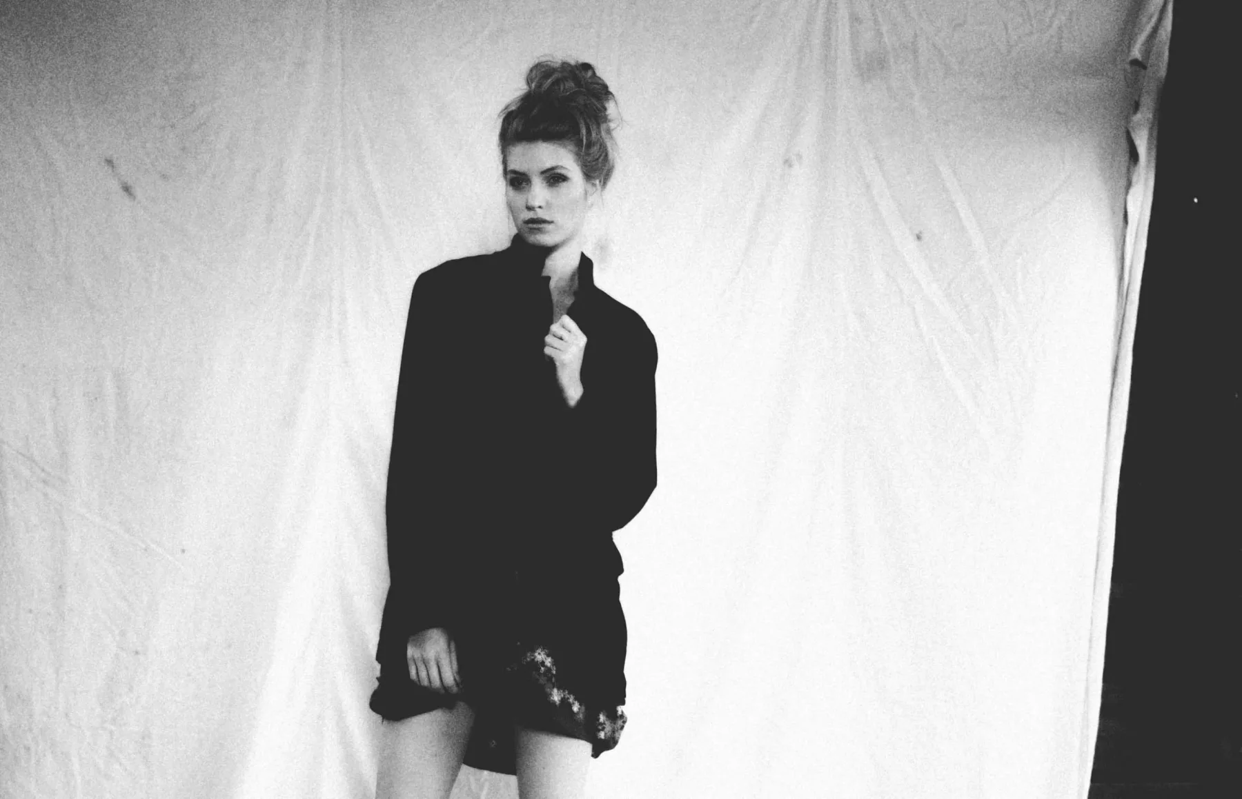 Short black dress, fine art fashion photography by Ivan Djikaev