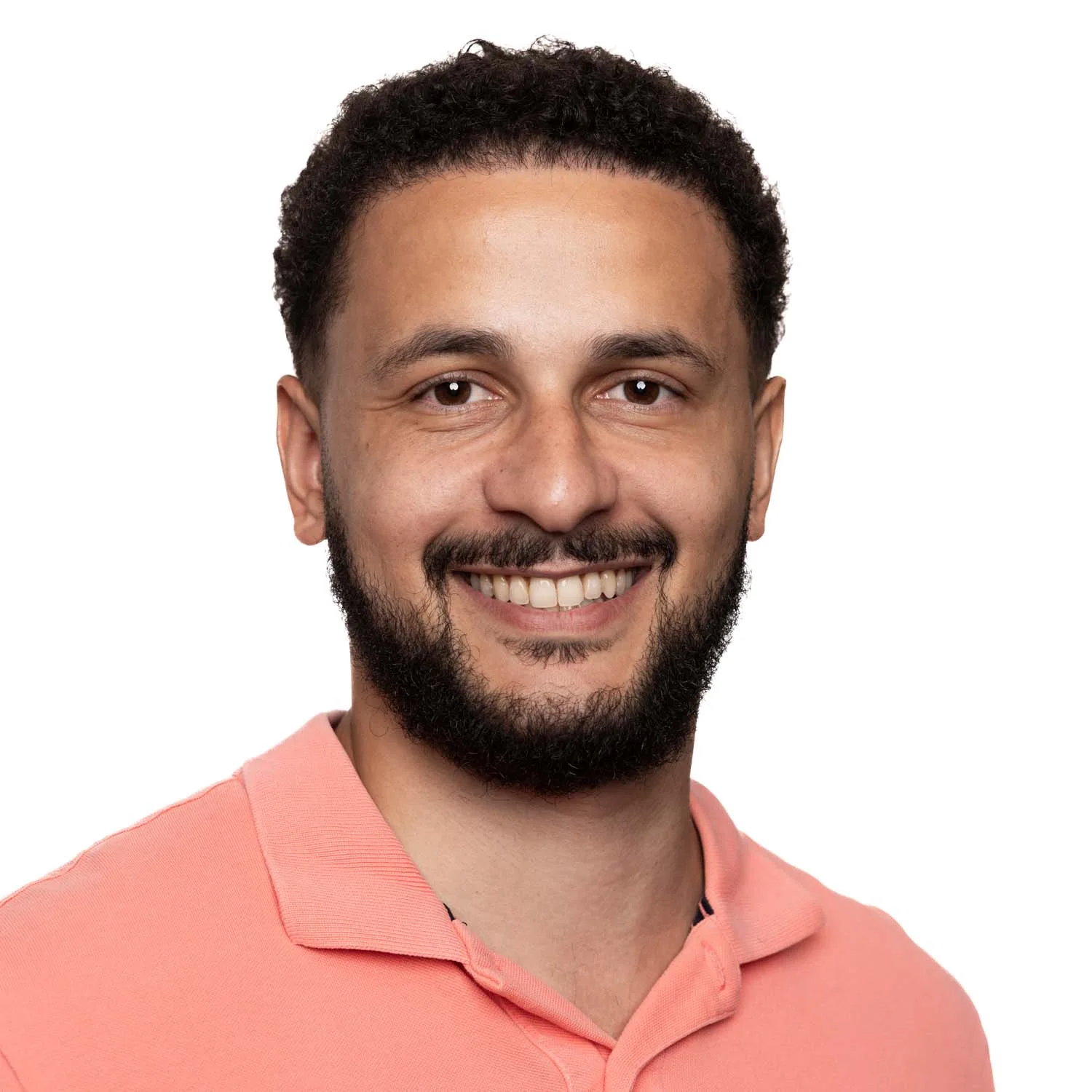 Professional headshot of a young man